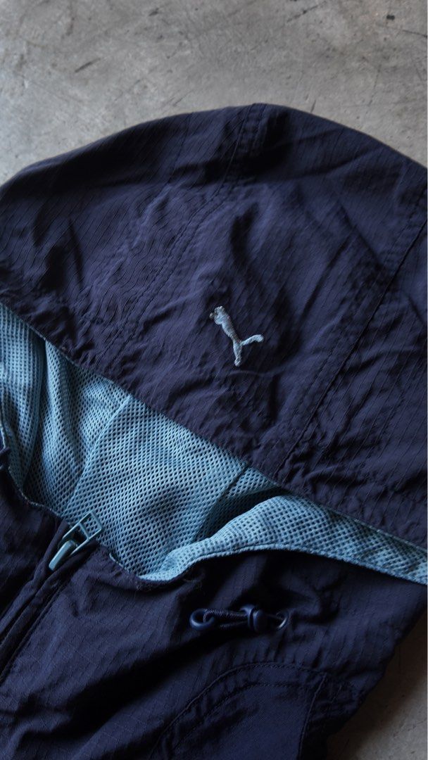 Puma Navy Blue Hooded Anorak Jacket (Category: Coats, Jackets and Outerwear) located in Samal. Submitted by jorts26 (Listing ID 1463369498, Image 3). Description: Vintage Puma Windbreaker Dimes:21x27 Flaws:None Price:₱750 Condition:Excellent Location:Bataan Shipping:J&T or LBC Negotiable .