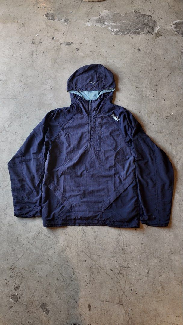 Puma Navy Blue Hooded Anorak Jacket (Category: Coats, Jackets and Outerwear) located in Samal. Submitted by jorts26 (Listing ID 1463369498, Image 1). Description: Vintage Puma Windbreaker Dimes:21x27 Flaws:None Price:₱750 Condition:Excellent Location:Bataan Shipping:J&T or LBC Negotiable .