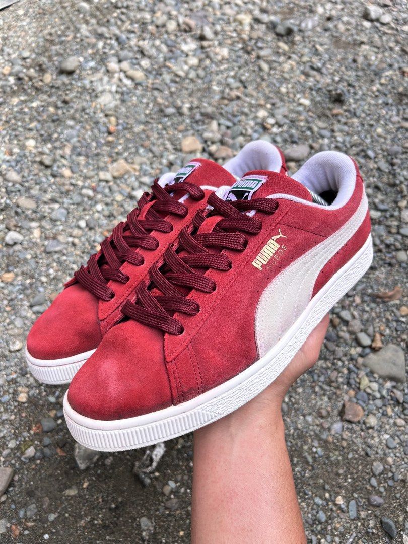 Puma Suede Classic Red Sneakers (Category: Sneakers) located in Cabanatuan. Submitted by thriftttttt (Listing ID 1463409265, Image 3). Description: - Classic red Puma Suede sneakers - Features iconic white stripe detail on the side - White sole - Deep red laces - Perfect for casual everyday wear - Shows some signs of wear on the sole and suede, but plenty of life left.