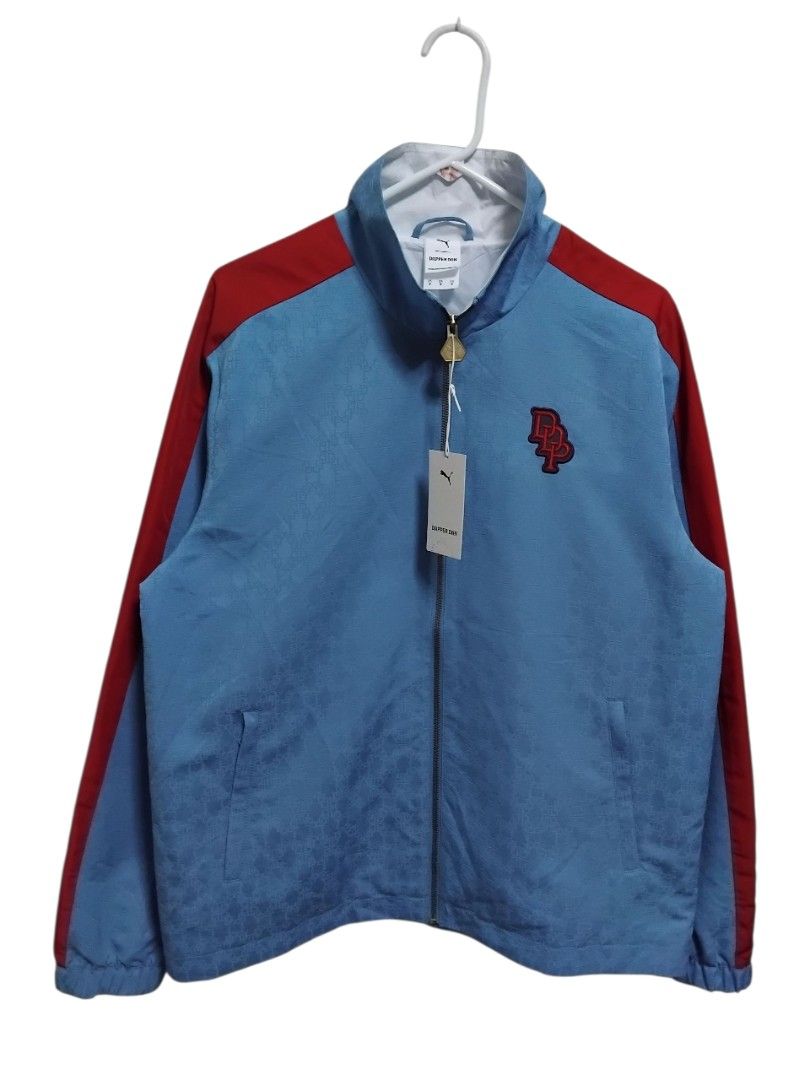 Puma x Dapper Dan Harlem T7 Track Jacket (Category: Coats, Jackets and Outerwear) located in Pasig City. Submitted by hustlexcurate (Listing ID 1463431574, Image 1). Description: Puma x Dapper Dan Harlem T7 Track Jacket Size MEDIUM on tag fits LARGE Dimensions: 23X28.