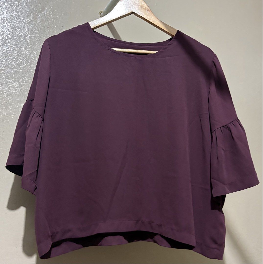 Purple Bell Sleeve Top (Category: Blouses) located in Manila. Submitted by stella_mari27 (Listing ID 1463457824, Image 1). Description: - Trendy purple cropped top - Elegant bell sleeves - Comfortable round neckline - Flattering drape fabric - Versatile for casual or dressy outfits - Pairs perfectly with high-waisted bottoms.