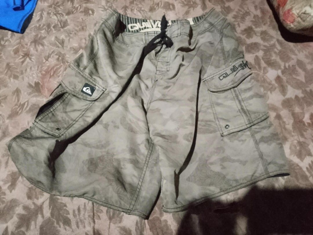 Quiksilver Camo Board Shorts (Category: Shorts) located in Cagayan de Oro. Submitted by barillorey77932 (Listing ID 1463365117, Image 2). Description: - Quiksilver board shorts - Camouflage pattern - Drawstring waist - Multiple pockets - Suitable for swimming or casual wear.