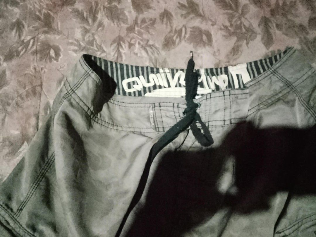 Quiksilver Camo Board Shorts (Category: Shorts) located in Cagayan de Oro. Submitted by barillorey77932 (Listing ID 1463365117, Image 1). Description: - Quiksilver board shorts - Camouflage pattern - Drawstring waist - Multiple pockets - Suitable for swimming or casual wear.