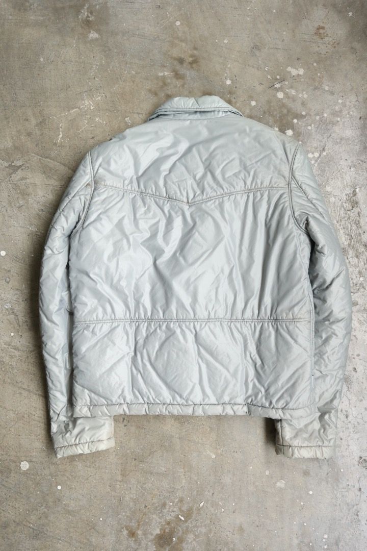 Raf Simons - F/W 03 - “Closer” - Rider Down Jacket (Category: Coats, Jackets and Outerwear) located in Manila. Submitted by graymatter_ (Listing ID 1463444689, Image 2). Description: Raf Simons - F/W 03 - “Closer” - Rider Down Jacket Tagged Size: 48 Condition: 8/10 Flaws: Overall Spots, Loose Stitchings on Lining Material: 100% Polyamide Zipper: Opti Made in: Belgium Dimensions Length: 27 Width: 23.5 Shoulder: 19 Sleeve: 27.