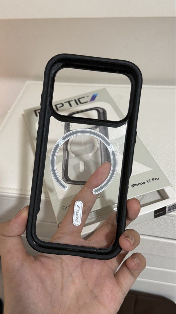 Raptic iphone 17 pro case (Category: Cases & Sleeves) located in Taguig. Submitted by prelovedby_mc. (Listing ID 1463420309, Image 3). Description: Bought mismo sa powermac ilang beses ko lang sya nagamit pero mabilis sya magasgasan see last pic* Rfs: naka torras case ako Still in good condition original price ₱ 1790 .