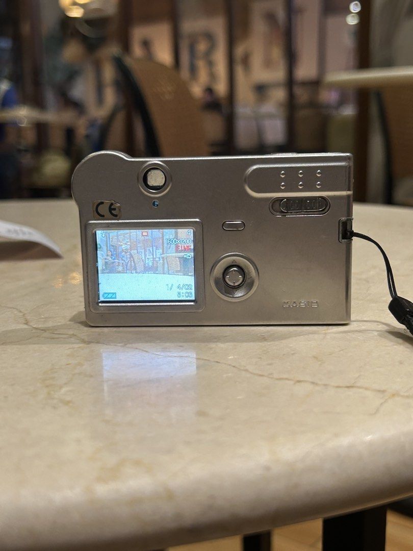 RARE Casio Exilim S2 digicam digital camera (Category: Cameras) located in Lagonoy. Submitted by nadayojiii (Listing ID 1463391375, Image 3). Description: Casio Exilim S2✨ NO FUNCTIONAL ISSUES ALL WORKING all buttons working flash working zoom working rare piece!✨ lcd has mild flaw(output not affected) CARD SIZE🪪✨ super thin!! has a viewfinder✨ COMPLETE SET inclusion: unit battery charger sd card strap stickers.