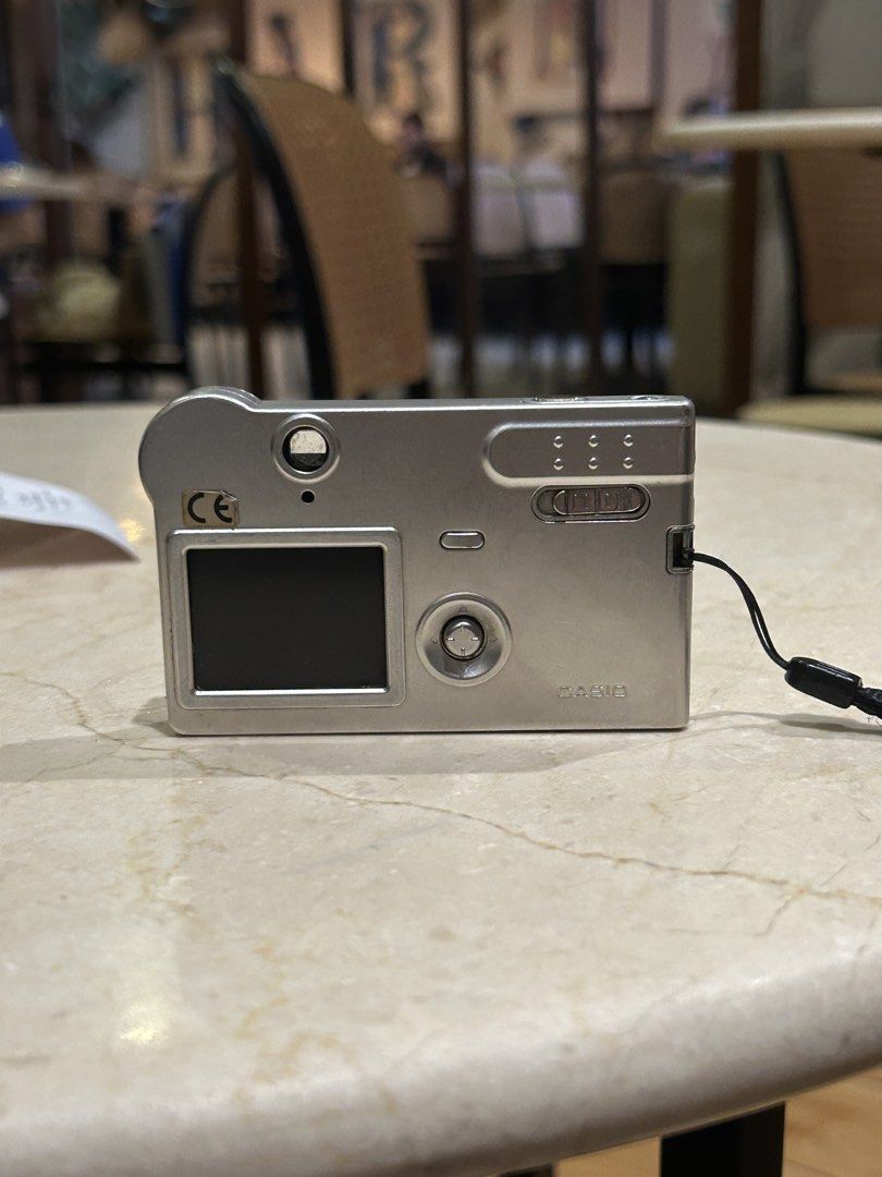 RARE Casio Exilim S2 digicam digital camera (Category: Cameras) located in Lagonoy. Submitted by nadayojiii (Listing ID 1463391375, Image 2). Description: Casio Exilim S2✨ NO FUNCTIONAL ISSUES ALL WORKING all buttons working flash working zoom working rare piece!✨ lcd has mild flaw(output not affected) CARD SIZE🪪✨ super thin!! has a viewfinder✨ COMPLETE SET inclusion: unit battery charger sd card strap stickers.