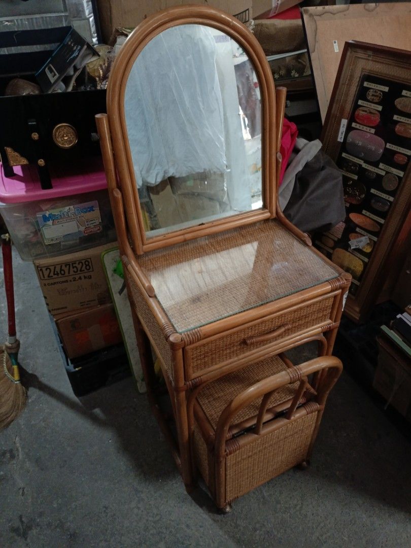 Rattan Vanity Table with Mirror and Stool (Category: Tables & Sets) located in Valenzuela. Submitted by feel_lucky (Listing ID 1463438891, Image 1). Description: - Vintage rattan vanity set - Includes mirror and stool - Vanity features a glass top - Drawer with red lining - Stool has a woven seat - Ideal for bedroom or dressing area.