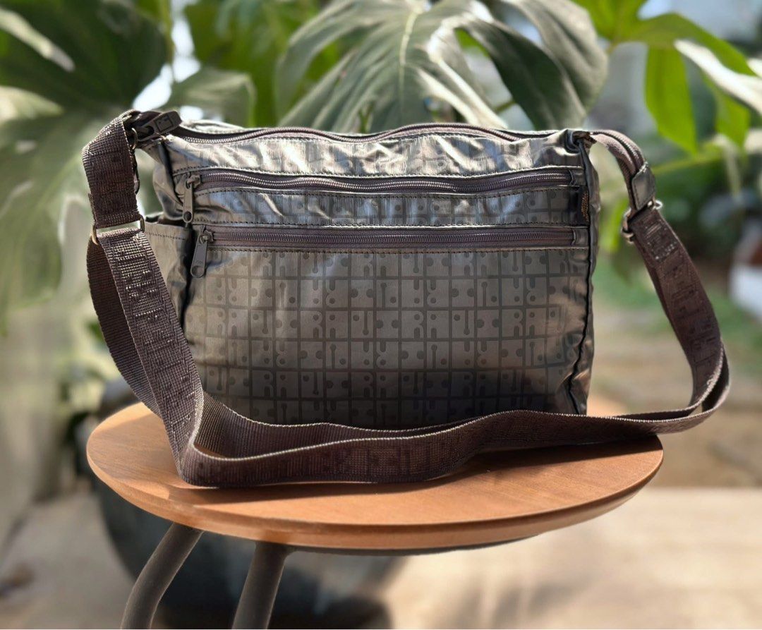 RaviRavi lightweight gray crossbody (Category: Cross-body Bags) located in Bulacan. Submitted by thriftbagcollections (Listing ID 1463400410, Image 2). Description: RaviRavi lightweight gray shoulder bag is a water-repellent, nylon crossbody made in Japan. Approx;H-6.5”W-9”D-3.5”.