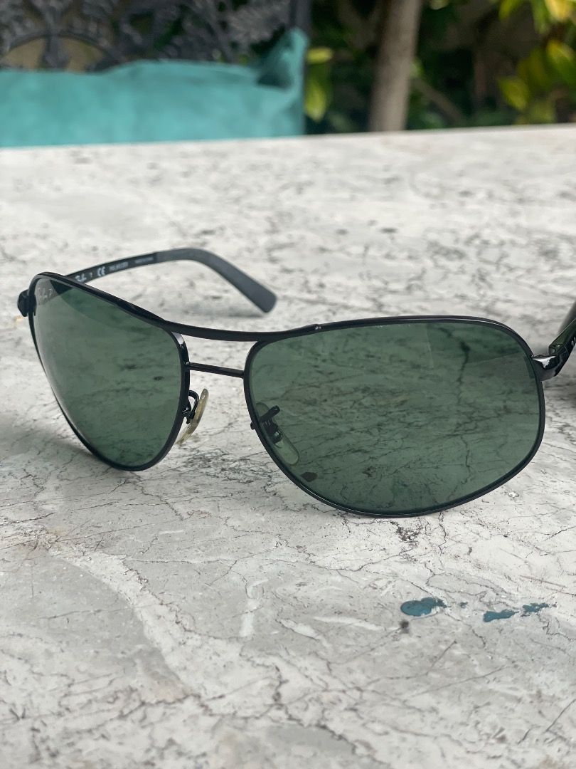 Ray-Ban Polarized Sunglasses (RB3387) (Category: Sunglasses & Eyewear) located in Caloocan City. Submitted by quickearth.1a8f3f (Listing ID 1463550532, Image 2). Description: FOR SALE — LIKE NEW Authentic Ray-Ban RB3387 002/9A • Black frame • Polarized lens • Size: 64□15 125 • Classic aviator/pilot style • Like-new condition — very minimal signs of use • Lenses are clean and clear • No major scratches or damage With original case and cloth .