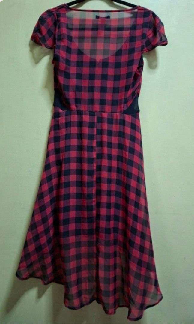 Red and Black Checkered Dress (Category: Dresses) located in Manila. Submitted by thrifter_lifestyle (Listing ID 1463390043, Image 2). Description: Brand: Material Girl (bought in the US) Zipper in front Sheer material with black lining Close up of pattern include Unique hemline Material: see tag Waist: 28" Bust: 32" Length: front 31", back 43" No issues 🙂 RFS: closet spring cleaning. this is actually my sister's - so no when worn pics🙂.