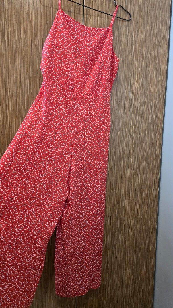 Red Floral Smocked Jumpsuit (Category: Jumpsuits) located in Cebu City. Submitted by kitty_12345_ (Listing ID 1463386449, Image 2). Description: Still negotiable per wag barat - Red jumpsuit with white floral print - Smocked bodice - Thin spaghetti straps - Wide leg style - Ideal for casual wear, picnics, and summer vibes - Comfortable and easy to wear MOP: gcash, mari, maya, gotyme MOD: Lbc Meetup: Parkmall.