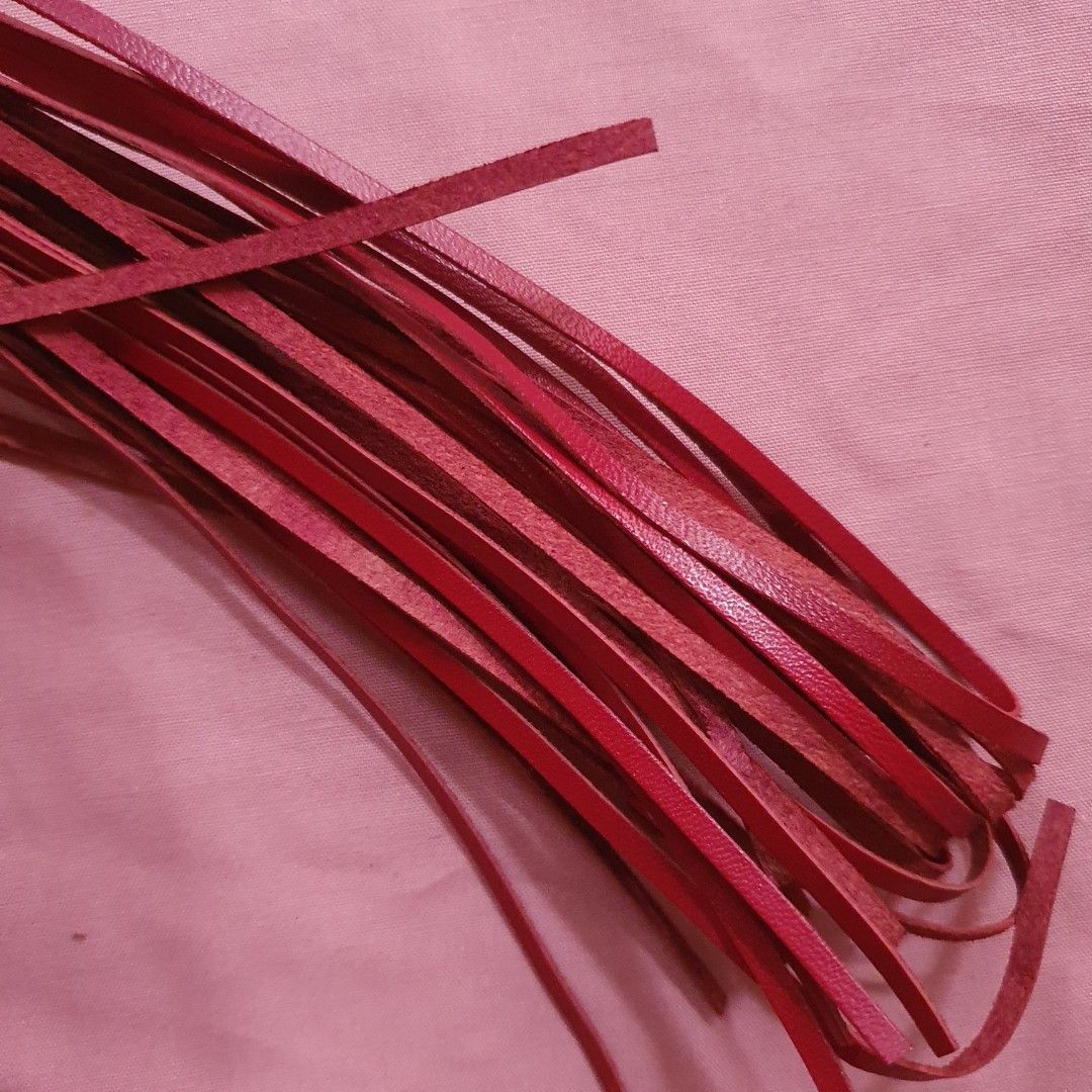 Red Leather Strips for Crafts (Category: Craft Supplies & Tools) located in Paranaque City. Submitted by cobien (Listing ID 1463465173, Image 3). Description: - Bundle of red leather strips - Perfect for DIY projects, jewelry making, and crafts - Thin and flexible material - Generous length for various uses - Selling as a complete lot.