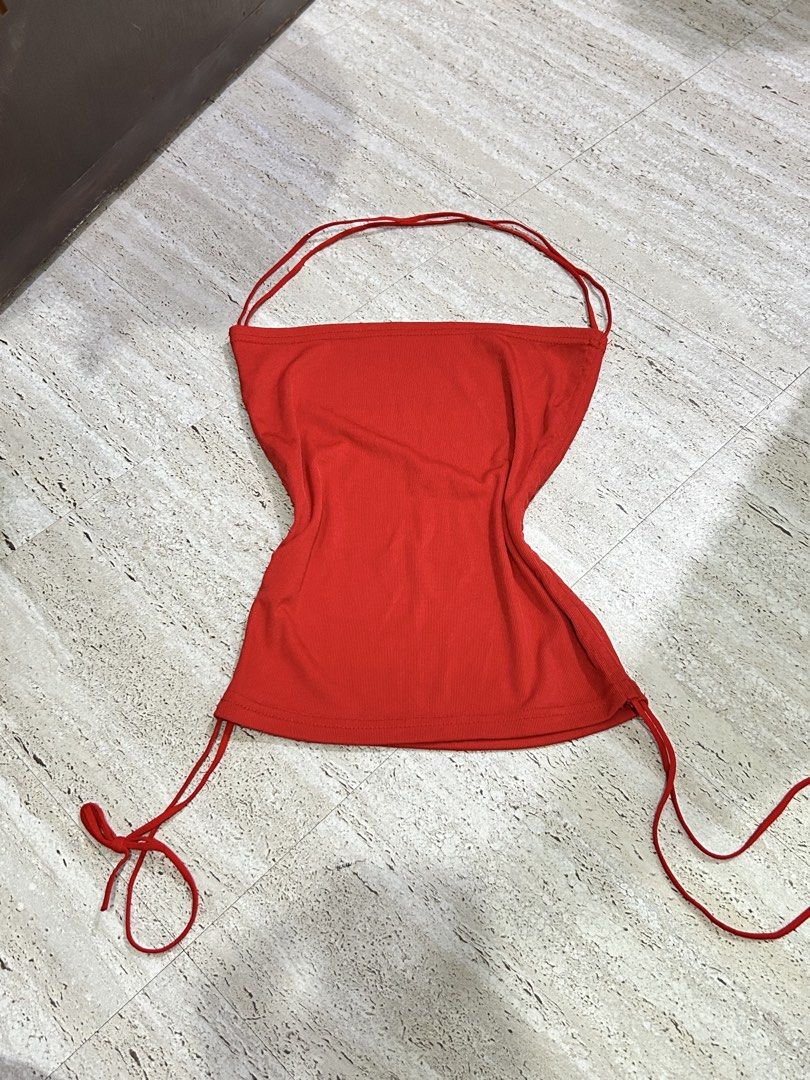 Red Ribbed Halter Neck Tube Top with Drawstring Sides (Category: Others Tops) located in Batangas. Submitted by nommi26 (Listing ID 1463416202, Image 1). Description: fits s to m - Red halter neck tube top - Ribbed material for texture - Adjustable drawstring ties on sides - Can be worn in multiple ways - Super cute and trendy - Ideal for summer or nights out.