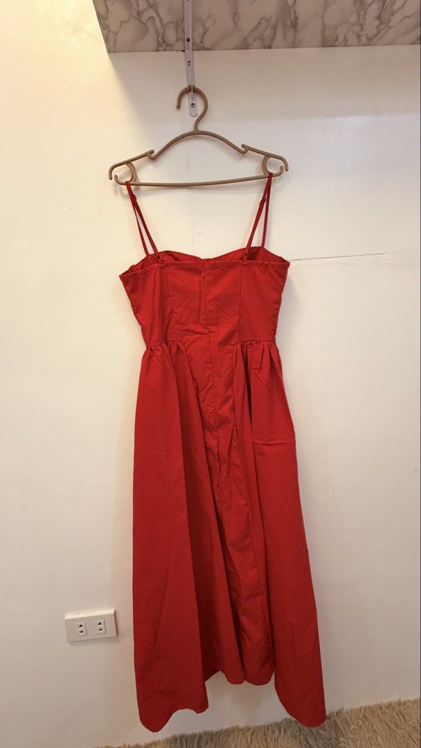 Red Spaghetti Strap Midi Dress (Category: Dresses) located in Angeles City. Submitted by hooni_park (Listing ID 1463481897, Image 2). Description: - Red midi dress - Spaghetti straps - Sweetheart neckline - Fitted bodice with flared skirt - Back zipper closure - Ideal for parties or a night out - Comfortable and stylish.