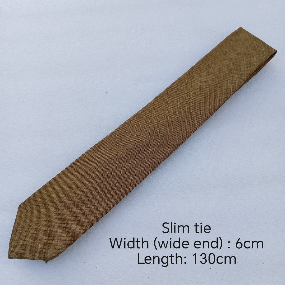 Reed cravate brown slim necktie / tie (Category: Ties) located in Abucay. Submitted by gibzzz123 (Listing ID 1463373437, Image 2). Description: • All items are ON HAND and ready to be shipped/picked up. • Items are preloved/ukay, so please expect minimal signs of usage unless stated otherwise. • No major issues — good condition unless otherwise indicated in the listing. • Actual color may slightly vary due to lighting and screen settings. • All a