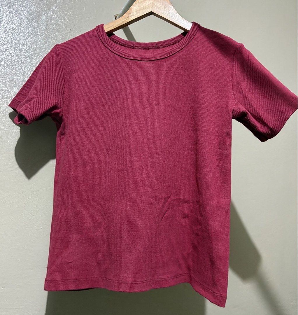 Ribbed Maroon T-shirt (Category: Shirts) located in Manila. Submitted by stella_mari27 (Listing ID 1463463616, Image 1). Description: - Classic maroon t-shirt - Features a stylish ribbed texture all over - Comfortable short sleeves and crew neck design - Versatile and easy to pair with any outfit - Ideal for casual everyday wear.