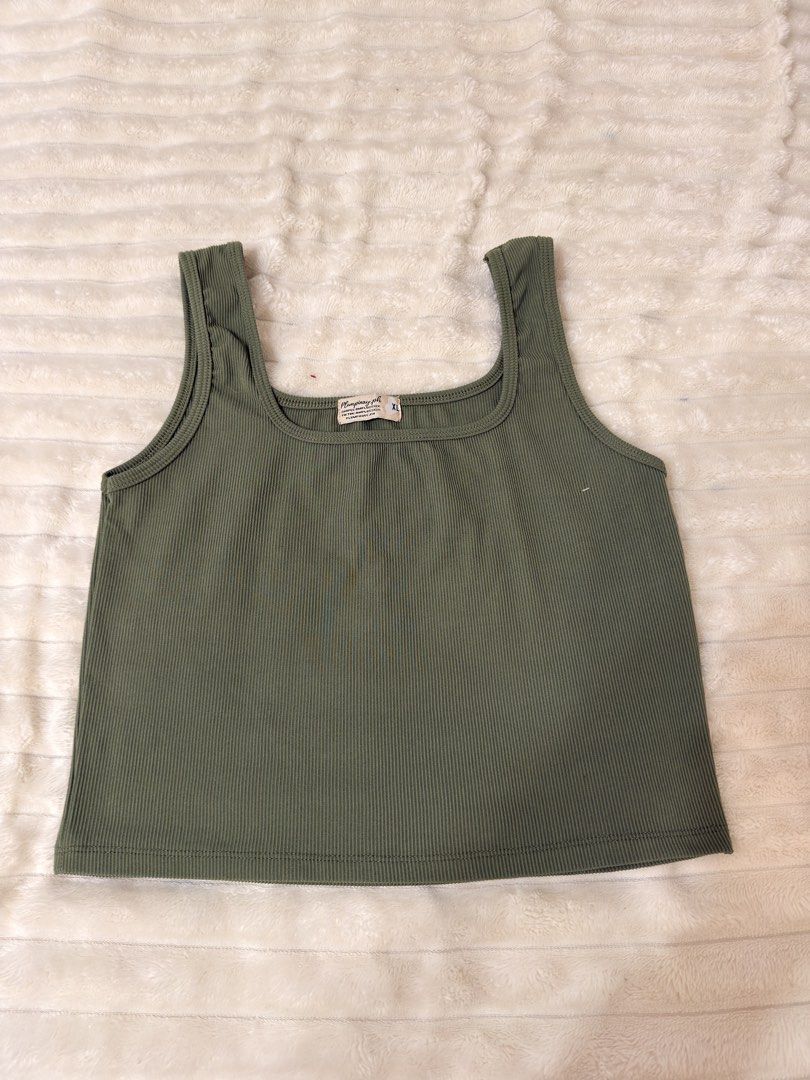 Ribbed Square Neck Tank Top - Olive Green (Category: Sleeveless) located in Rizal. Submitted by rianaht (Listing ID 1463400037, Image 2). Description: Olive green ribbed tank top - Flattering square neckline - Can fit Medium to Large - Used once 🌸 RFS: Decluttering 🌸 Delivery only to be shouldered by the buyer. 🌸 Payment via GCash / Maya / Maribank.