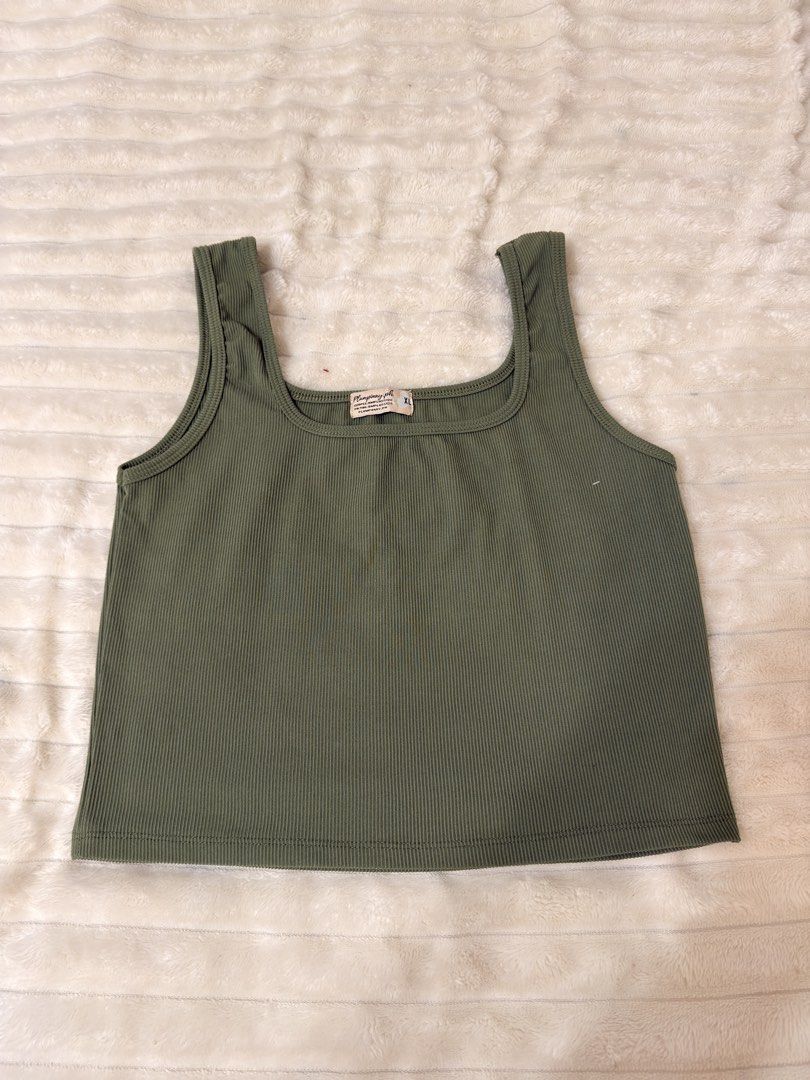 Ribbed Square Neck Tank Top - Olive Green (Category: Sleeveless) located in Rizal. Submitted by rianaht (Listing ID 1463400037, Image 1). Description: Olive green ribbed tank top - Flattering square neckline - Can fit Medium to Large - Used once 🌸 RFS: Decluttering 🌸 Delivery only to be shouldered by the buyer. 🌸 Payment via GCash / Maya / Maribank.