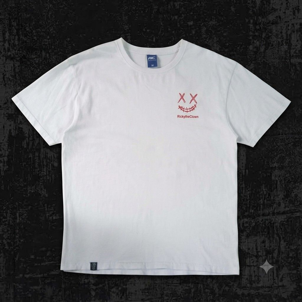 Rickyisclown white tee (Category: Tshirts & Polo Shirts ) located in Pasig City. Submitted by rjkfindsofficial (Listing ID 1463344025, Image 1). Description: - Brand: RIC Rickyisclown - Color: White - Graphic: Red smiley face on front, larger smiley with text 'WE WILL HAVE A RICH LIFE' on back - Material: 100% Cotton - Size: Medium (M) - Issue: Minimal stain (di halata) .