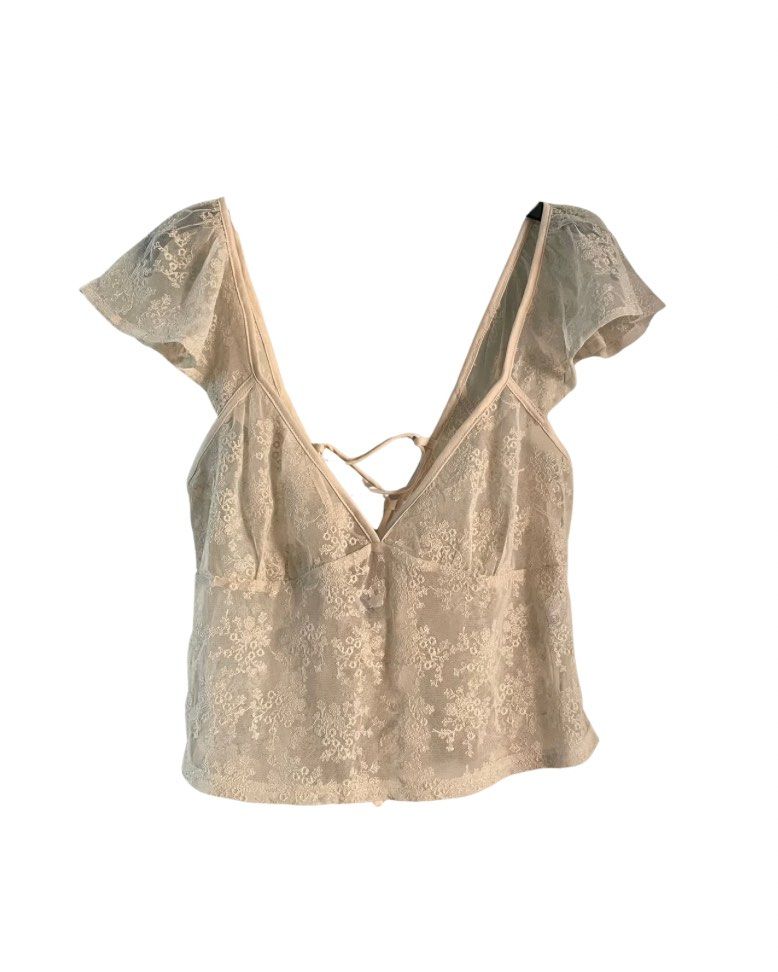 Rita Ora x Primark Lace Mesh Top (Category: Others Tops) located in Tagum. Submitted by declutterflyy (Listing ID 1463335602, Image 1). Description: - Cream lace top - Collaboration: Rita Ora x Primark - No when worn photo.