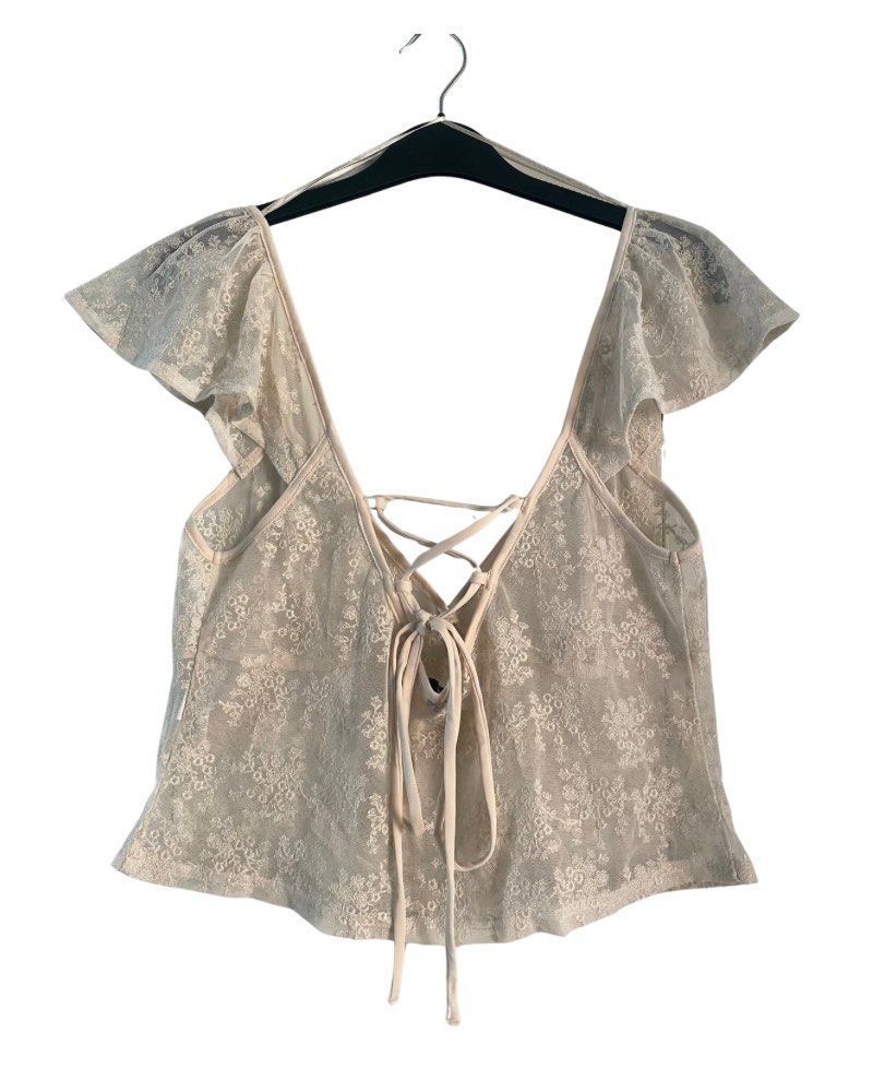 Rita Ora x Primark Lace Mesh Top (Category: Others Tops) located in Tagum. Submitted by declutterflyy (Listing ID 1463335602, Image 2). Description: - Cream lace top - Collaboration: Rita Ora x Primark - No when worn photo.