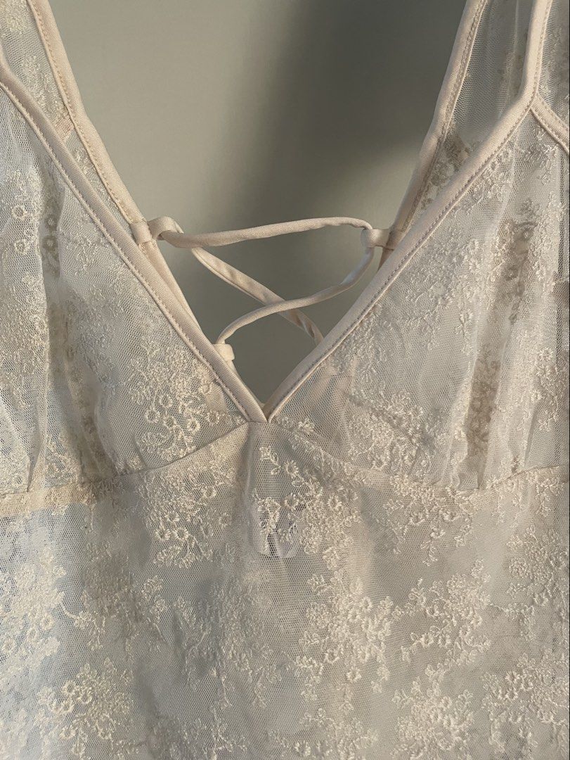 Rita Ora x Primark Lace Mesh Top (Category: Others Tops) located in Tagum. Submitted by declutterflyy (Listing ID 1463335602, Image 3). Description: - Cream lace top - Collaboration: Rita Ora x Primark - No when worn photo.