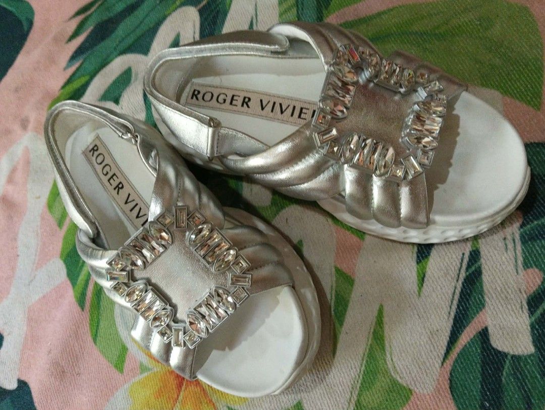 Roger Vivier Silver Crystal Buckle Sandals (Category: Flats & Sandals) located in Davao. Submitted by marissasof29286 (Listing ID 1463331494, Image 3). Description: -Authentic Roger Vivier silver sandals -Iconic crystal buckle detail -Secure and comportable slingback strap -Padded straps and sole for all day comfort -Versatile: dress up or down -Comes with original box -23.5 cm on tape -No issue.