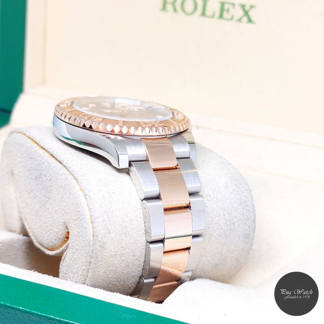 Rolex 37mm 18K Half Rose Gold Chocolate Dial Yachtmaster REF: 268621 (Box, Cert & Green Tag-2018) (Category: Watches) located in Singapore. Submitted by pngwatchdealer (Listing ID 1463537827, Image 3). Description: [SPECIFICATIONS] **Watch comes in full option (Box, Cert & Green Tag)** **Straight bracelet** Brand: Rolex Model: Oyster Perpetual Chocolate Dial 37mm Yachtmaster Date (REF: 268621)(AN)(18)(O) Movement: Automatic (Self-Winding) Functio