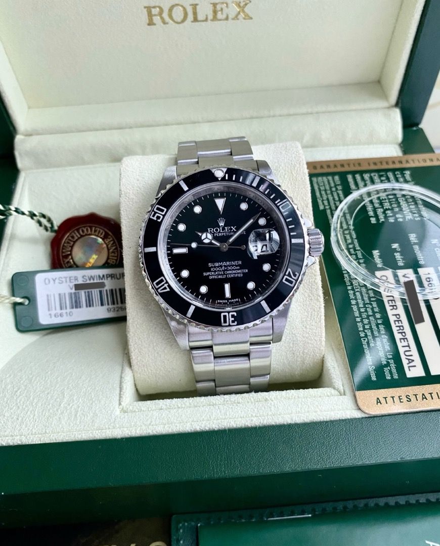 Rolex Submariner Date 16610T 40mm (Category: Luxury Watches) located in Quezon City. Submitted by thetimecapsule.ph (Listing ID 1463493251, Image 1). Description: 2009 Rolex Submariner Date 16610T 40mm Case diameter: 40mm Classic stamped fliplock clasp Sapphire crystal glass (Lens over date) Solid end links, 904L oyster bracelet Transitional year (Pre-ceramic bezel) Reference: 16610T (No lug-holes) Last production: V-serial (2009) Mint condition: