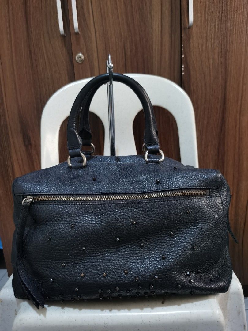 ROUGE & LOUNGE (Category: Shoulder Bags) located in Bacolod City. Submitted by mzb06 (Listing ID 1463339417, Image 1). Description: Boston style, Genuine soft Leather material, w/ studs design, clean inner compartment. No scratches on the leather. Detailed pictures posted for reference..