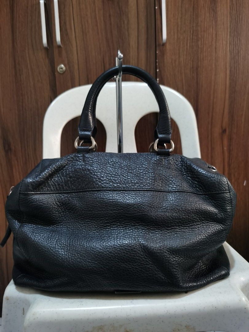 ROUGE & LOUNGE (Category: Shoulder Bags) located in Bacolod City. Submitted by mzb06 (Listing ID 1463339417, Image 2). Description: Boston style, Genuine soft Leather material, w/ studs design, clean inner compartment. No scratches on the leather. Detailed pictures posted for reference..