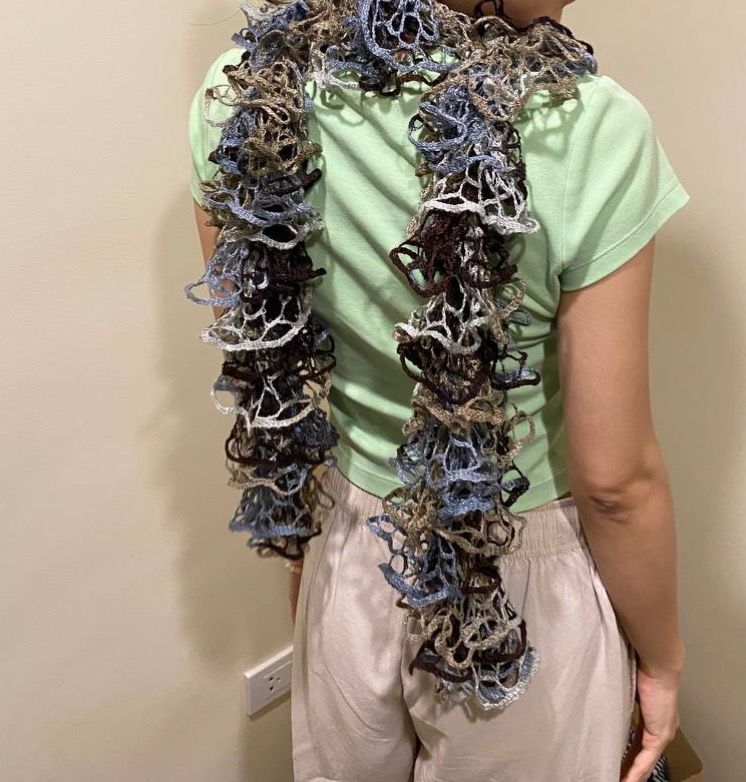Ruffle Yarn Scarf - Blue, Brown, Gold (Category: Coats, Jackets and Outerwear) located in Quezon City. Submitted by eatupcommunity (Listing ID 1463497686, Image 2). Description: [FOR FUNDRAISING: EATUP FOOD SCHOLARSHIP PROGRAM] 180 each Pop of color and flair to any outfit! Ideal for cooler weather or as a stylish fashion accessory!.