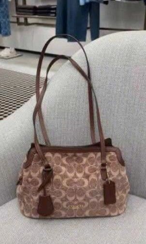 SALE!! COACH ELISE SHOULDER BAG (Category: Shoulder Bags) located in Pasig City. Submitted by ttitalaana20198 (Listing ID 1463386593, Image 2). Description: FIXED PRICE WITH INCLUSIONS ONHAND DELIVERY VIA LALAMOVE ACTUAL PHOTO POSTED ❌️NO MEET UP ( BUSY GURL HERE).