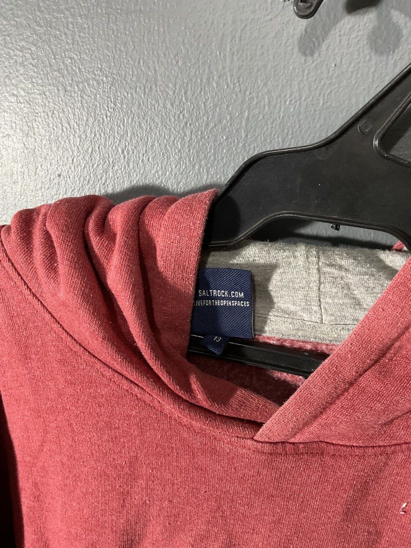 Saltrock Red Graphic Hoodie (Category: Coats, Jackets and Outerwear) located in Manila. Submitted by noblewater-1a3b (Listing ID 1463330500, Image 3). Description: - Red Saltrock hoodie with a cool graphic print - Made from a comfortable 60% cotton, 40% polyester blend - Features a front pocket and an adjustable hood - Designed in England, Made in India - Ideal for everyday casual wear.