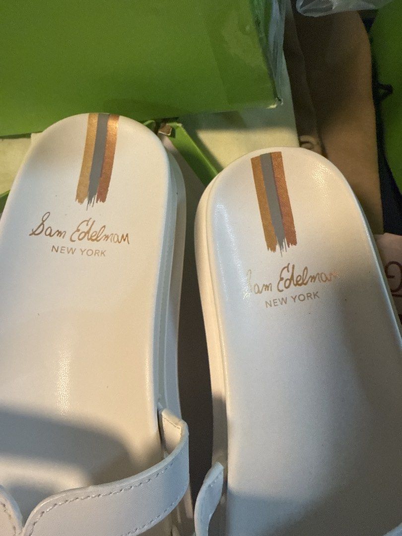 Sam Edelman White H Logo Slides Sandals (Category: Everything Else Others) located in Angeles City. Submitted by migs_font29 (Listing ID 1462368428, Image 2). Description: - Brand: Sam Edelman - Color: White - Design: Slides with iconic H logo detail - Comfort: Super comfy for everyday wear - Style: Stylish and versatile - Condition: Brand new with original box - Available Sizes: 38.5.