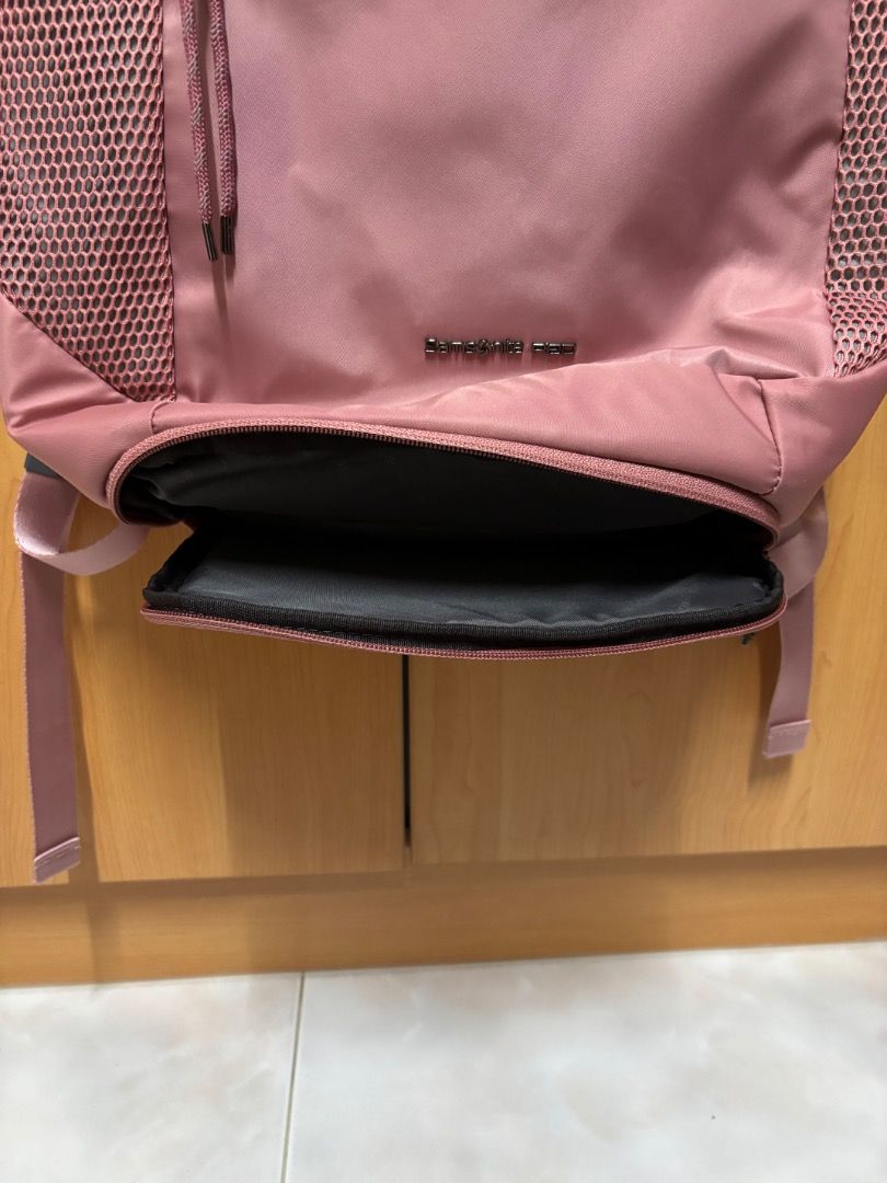 Samsonite backpack (Category: Backpacks) located in Singapore. Submitted by ma23456 (Listing ID 1463529967, Image 2). Description: As good as new. Used 2-3 times. Lots of compartments. Photo lighting has lead to like as if it’s different colors. It’s the light pink color Self collect.