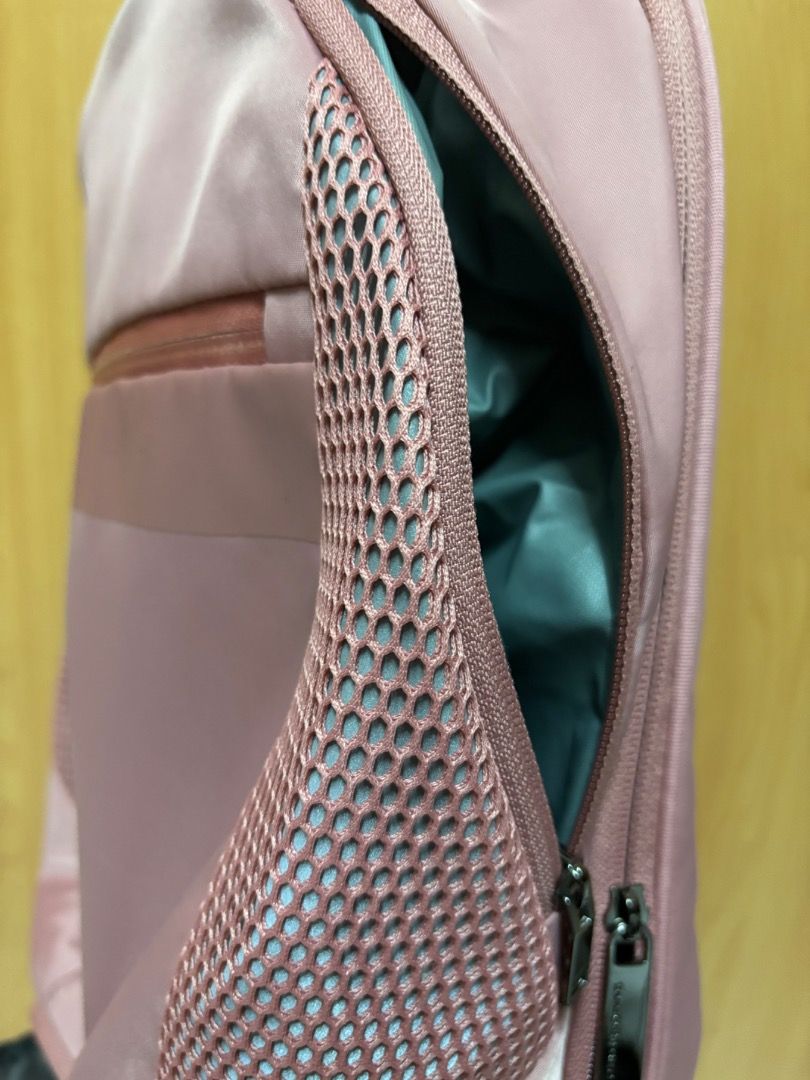 Samsonite backpack (Category: Backpacks) located in Singapore. Submitted by ma23456 (Listing ID 1463529967, Image 4). Description: As good as new. Used 2-3 times. Lots of compartments. Photo lighting has lead to like as if it’s different colors. It’s the light pink color Self collect.