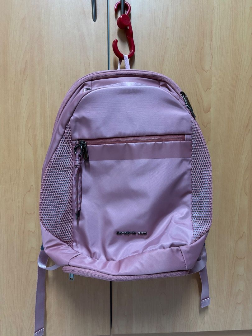 Samsonite backpack (Category: Backpacks) located in Singapore. Submitted by ma23456 (Listing ID 1463529967, Image 1). Description: As good as new. Used 2-3 times. Lots of compartments. Photo lighting has lead to like as if it’s different colors. It’s the light pink color Self collect.