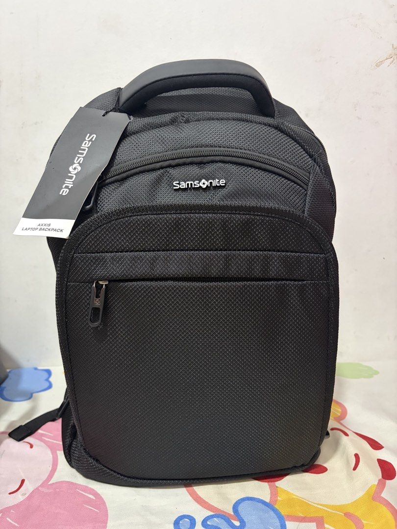 Samsonite Black Laptop Backpack (Category: Backpacks) located in Pasig City. Submitted by antonyeeeta (Listing ID 1463358518, Image 1). Description: - Brand new Samsonite backpack with tags still attached - Classic black color - Multiple compartments for excellent organization - Padded shoulder straps for maximum comfort - Ideal for carrying laptops and everyday essentials.