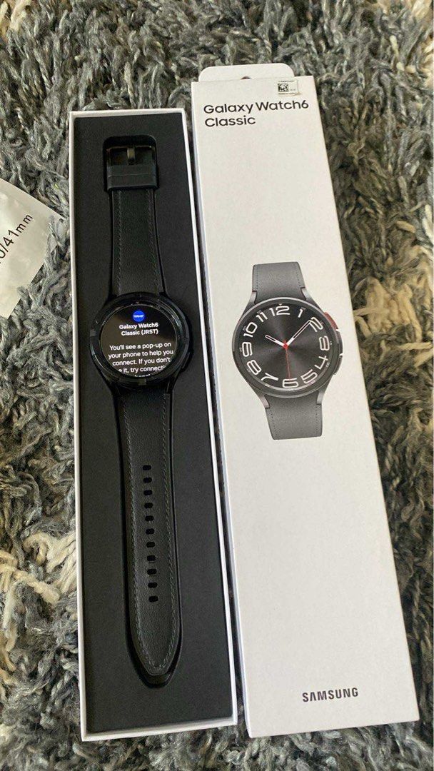 Samsung Galaxy Watch6 Classic Smartwatch (Category: Wearables & Smart Watches) located in Balanga. Submitted by rhine1810 (Listing ID 1463496527, Image 2). Description: - Samsung Galaxy Watch6 Classic - Comes with original black leather strap - Includes original box - Screen displays connection prompt - Ideal for fitness tracking and staying connected.