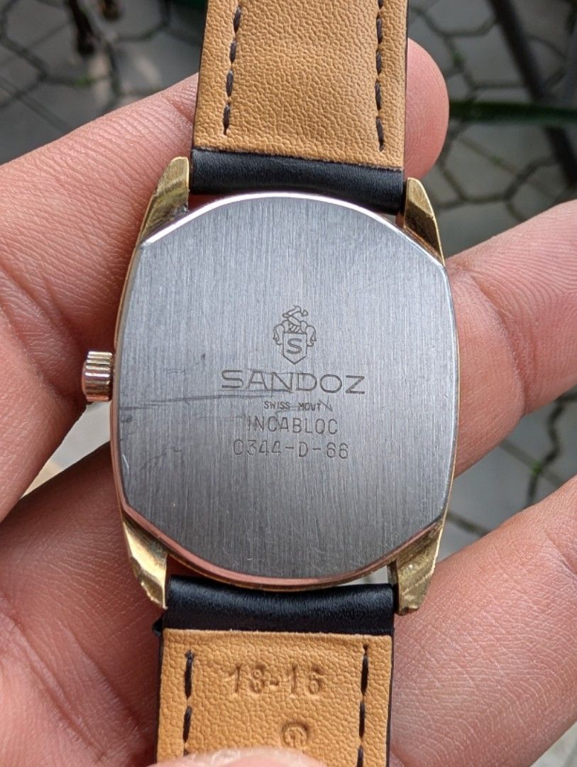 Sandoz Men's Watch (Category: Men's Watches) located in Makati City. Submitted by greatbuysmnl (Listing ID 1463385010, Image 3). Description: Brand: Sandoz Type: Men's Watch Case and Dial: Gold-tone Gold-plated Swiss Made 35mm x 31mm with crown 17 Jewels incabloc with diamond marker at 12 in good working condition .
