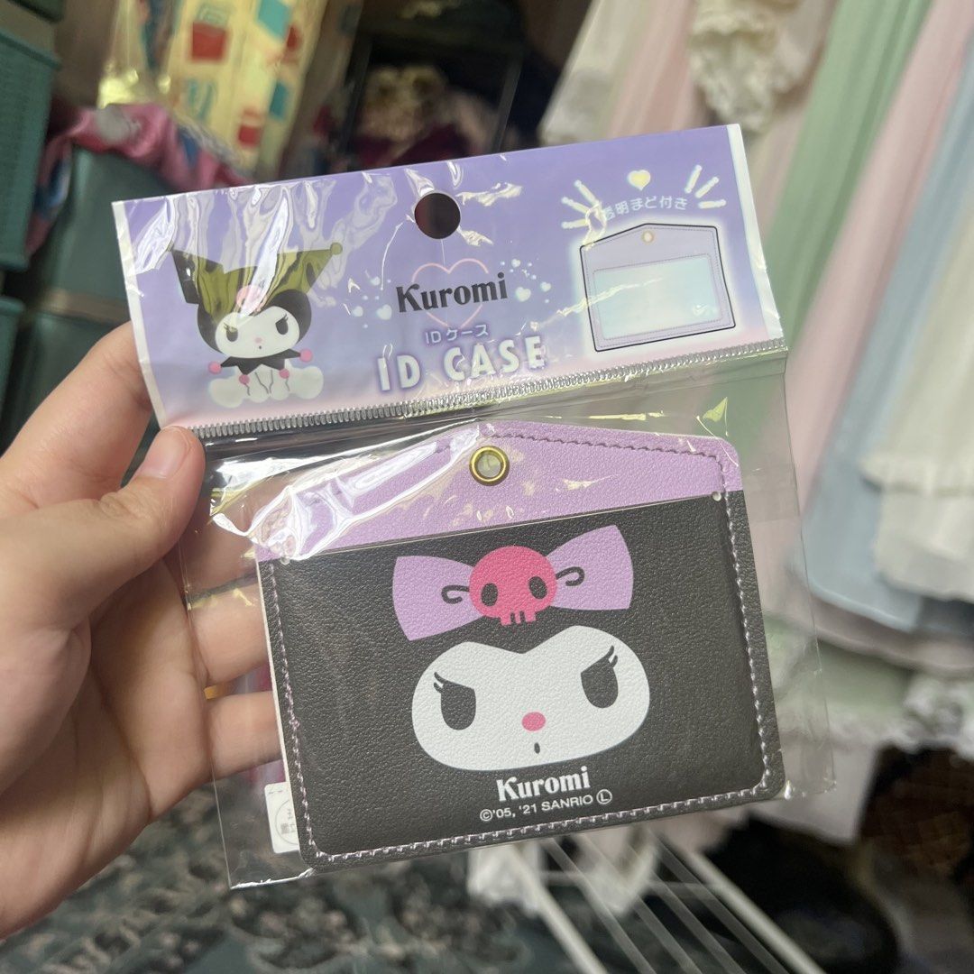 Sanrio Kuromi ID Card Case Holder (Category: Wallets & Card holders) located in Quezon City. Submitted by mei_declutters (Listing ID 1463407893, Image 1). Description: - Adorable Kuromi ID card holder - Stylish purple and black design featuring Kuromi's face - Includes a convenient loop for attaching to bags or lanyards - Officially licensed Sanrio product - Manufactured in China by Friend Co., LTD. - Ideal for school, work, or everyday use.