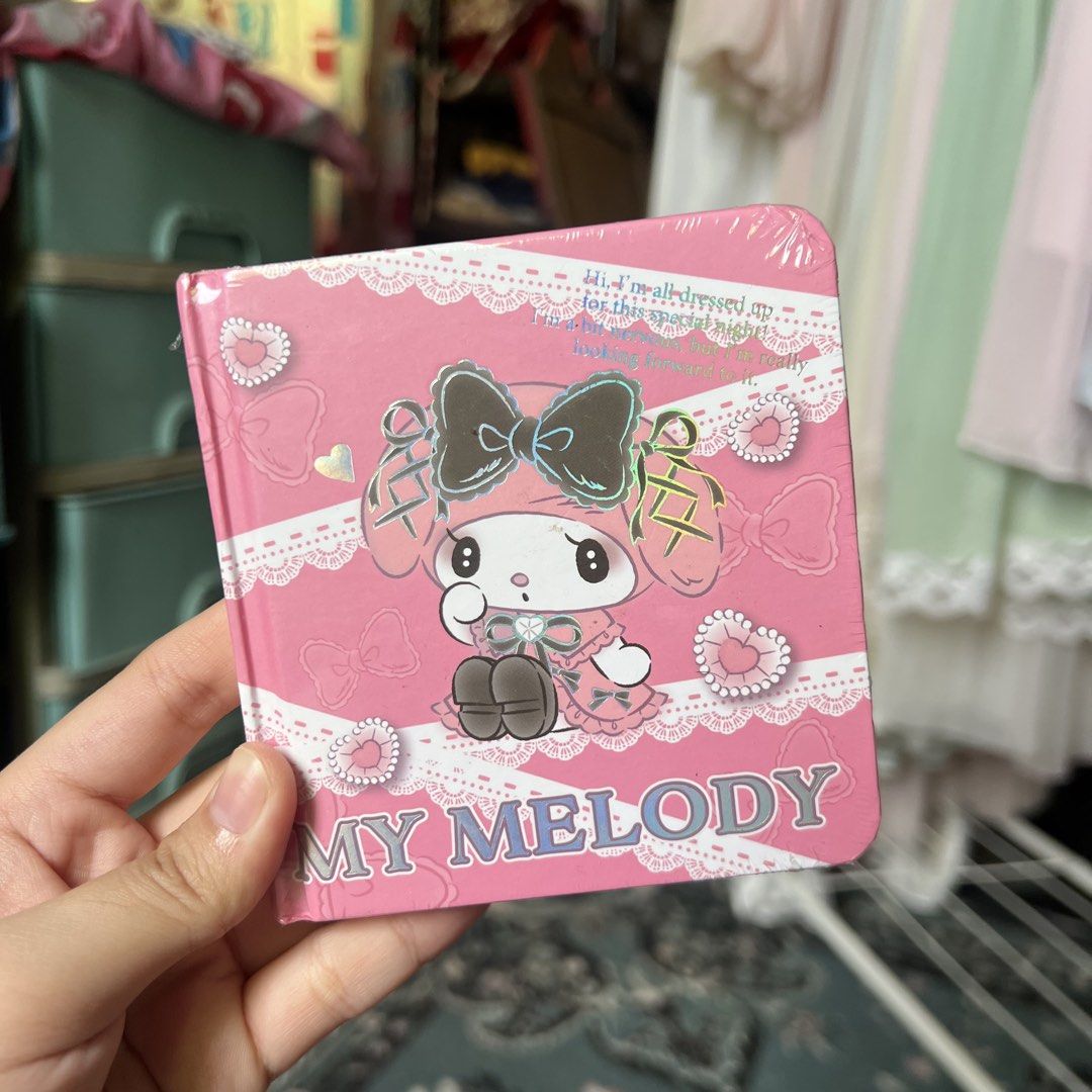 Sanrio My Melody Pink Hard Notebook (Category: Stationery & School Supplies) located in Quezon City. Submitted by mei_declutters (Listing ID 1463402870, Image 1). Description: - Adorable My Melody design - Sweet pink color with charming lace and bow details - Compact and portable size, perfect for on-the-go notes - Ideal as a thoughtful gift for stationery lovers.