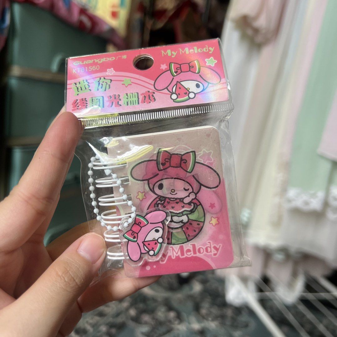 Sanrio My Melody Super Mini Notebook Charm (Category: Stationery & School Supplies) located in Quezon City. Submitted by mei_declutters (Listing ID 1463405126, Image 1). Description: - Adorable My Melody mini notebook - Features a cute watermelon theme - Spiral bound for easy page turning - Ideal for jotting down notes or as a small gift - Perfect for any Sanrio fan - Compact size: approximately 60x85mm.