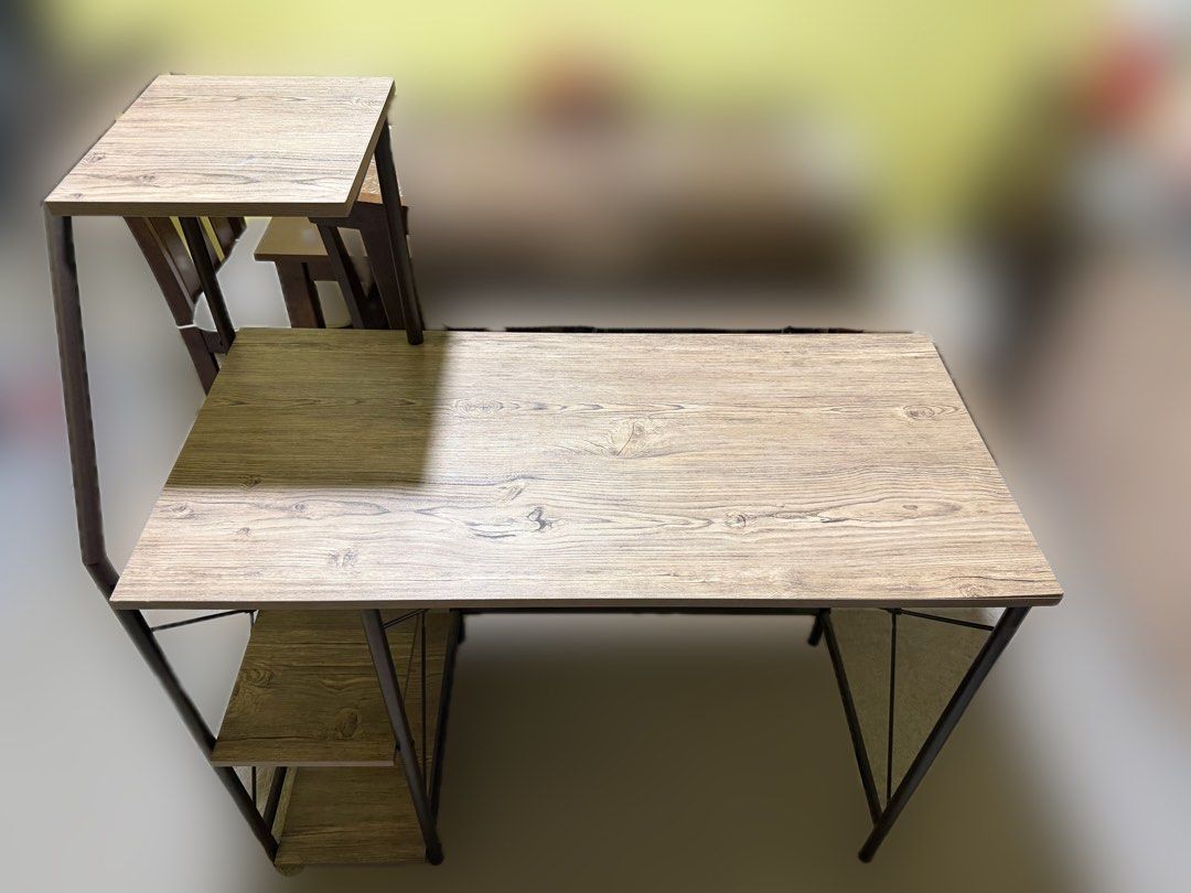 San-Yang Computer Table Oak & Brown 401625 (Category: Tables & Sets) located in Caloocan City. Submitted by catwonrideul (Listing ID 1463384497, Image 2). Description: Price lowered alr from 2K. Bought for ₱3,310.75 at San-Yang store. - With dent, umangat yung side kasi nabasa but everything else is still okay. - Materials: Particle Board, PVC - Size: 102 x 48 x 119 cm (LWH).