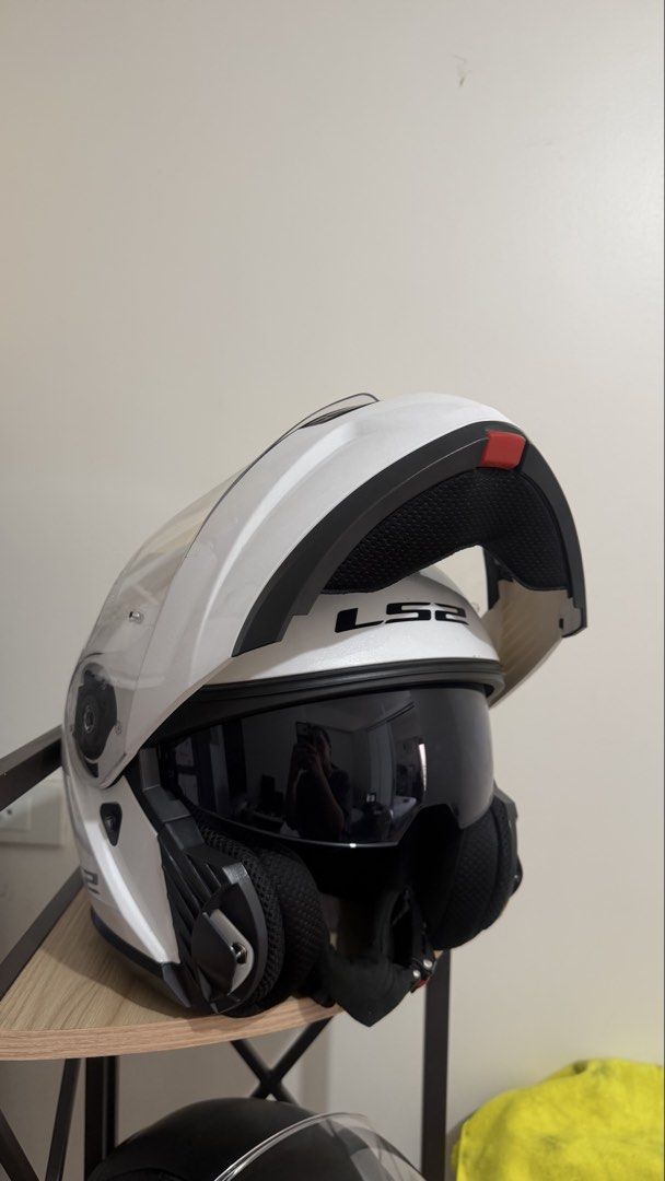 Selling LS2 helmet bundle 5k (Category: Helmets and other Riding Gears) located in Quezon City. Submitted by cristealyanna (Listing ID 1463398280, Image 2). Description: Top Helmet (White LS2 Modular / Dual-Visor) - Size XXL Bottom Helmet (Matte Black LS2 Full-Face with Red Interior) - Size L.