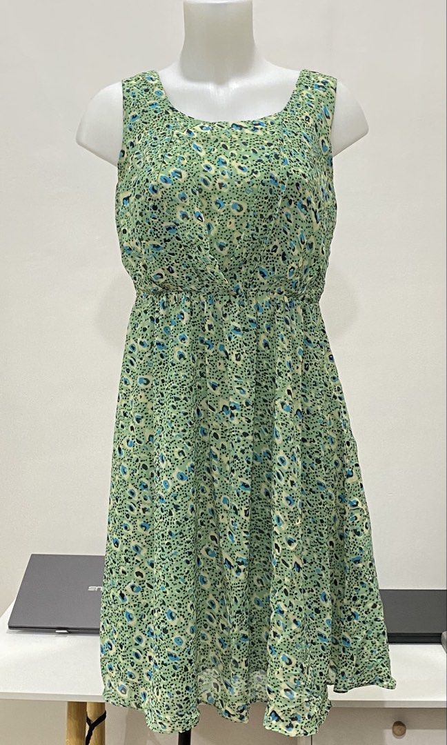 Serene Dress - PL-002 (Category: Dresses) located in Quezon City. Submitted by luckyphoenix.7 (Listing ID 1463399042, Image 1). Description: - Light green sleeveless dress - Cute blue and black floral print - Elasticated waist for comfort - Zipper closure - Size S-M - Ideal for casual outings.