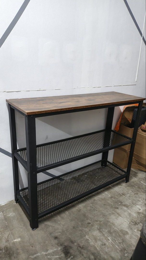 Shelf (negotiable) (Category: Other Home Furniture) located in Quezon City. Submitted by declutter.clubph (Listing ID 1463389546, Image 2). Description: Metal-wooden table shelf From 5.3k now for sale at ₱3,000✨ Price still negotiable ✨ Location: RMT industrial complex, muntinlupa RMT warehouse 31AD.