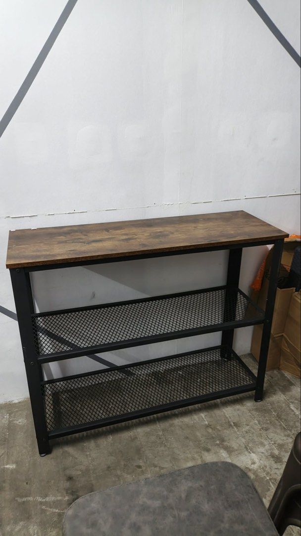 Shelf (negotiable) (Category: Other Home Furniture) located in Quezon City. Submitted by declutter.clubph (Listing ID 1463389546, Image 3). Description: Metal-wooden table shelf From 5.3k now for sale at ₱3,000✨ Price still negotiable ✨ Location: RMT industrial complex, muntinlupa RMT warehouse 31AD.